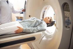 Doctor performing computed tomography test stock photo