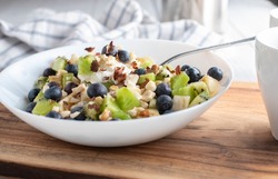 Breakfast bowl with fruits, nuts and yogurt