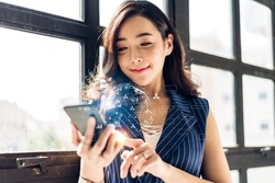 Success Businesswoman use smartphone with digital technology link internet connection network earth global world map connect internet online.Business world success and technology