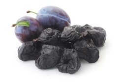 Prunes And Plums Isolated On White
