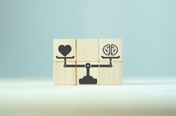 Balancing hard and soft skills concept. Training of skills Human resource management(HRM). wooden cubes with hard and soft skills on scales icon for comparison human skills. Grey background copy space