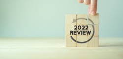 Annual review in 2022, business, customer review. Review evaluation time for inspection assessment auditing. Review for learning, improvement, planning and development. End of year business concept.