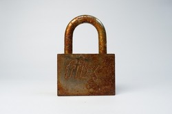 Rusty padlock isolated with white background