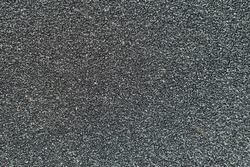 black rough surface The surface of the sandpaper is rough and coarse. rough texture background