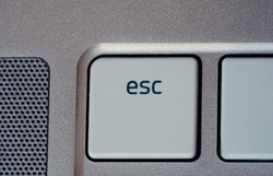 laptop keyboard focused on the escape key