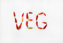 concept of eco lifestyle and vegan eating made from red chili peppers 
