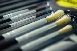 close up of pain brush set, new pain brush set, different pain brushes, color paint brush