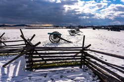 Civil War cannons in the snow at the Gettysburg National Military Park on the field of Pickett's Charge. 