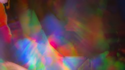 Psychedelic abstract background splash pattern. Trippy light exposure with swirling rainbow colors 