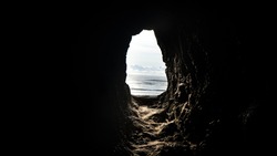 Photo of a cave by the Pacific Ocean in Oregon