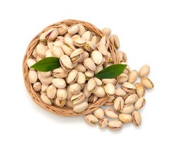 pistachios close up in basket . Isolated on a white background.