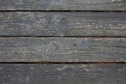 Pattern, wooden floor, old balcony that is wet after the rain, wooden terrace, old gray wood.