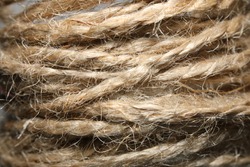 Twine texture. Rope (twine) jute brown, macro photography. Threads close up.