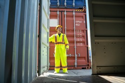 Container worker working at container cargo freight ship,Business logistic concept, Import and export concept.