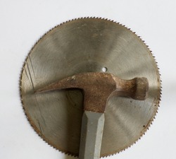 A Hammer Head and a Saw Blade