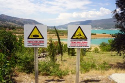 Two Warning Signs Both in Turkish and in English by Arapapisti Canyon. 