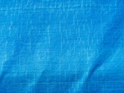 Abstract blue plastic woven sack texture