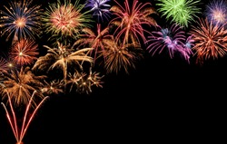 Fantastic colorful fireworks with black copyspace, perfect for the New Year, Independence Day or other celebrations