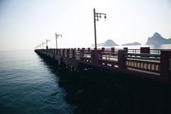 Sea water and fishing port bridges are docked in Prachuap Bay, one of the three bay towns. Prachuap Khiri Khan, Thailand