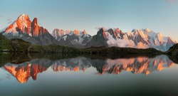 Magical sunset panorama of the Lac Blanc lake and Mont Blanc (Monte Bianco) on background, Chamonix location. Beautiful outdoor scene in Vallon de Berard Nature Reserve, France