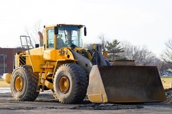 The heavy building bulldozer industry yellow shovel