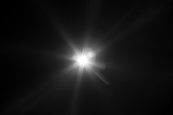 White light flare special effect in dark black