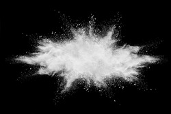 Freeze motion of white powder explosion on black background.r, White color glitter texture on black background.