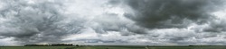 Panorama of cloudy gray sky