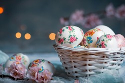 Decoupage decorated Easter eggs with cherry blossom flowers