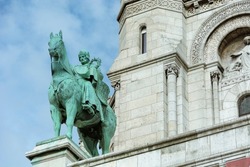 Paris, France. Sculpture of a King Saint Lois, Crusader knight on a horse on the facade of the Basilica of the Sacred Heart.