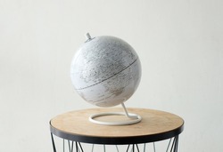 globe white on table simple modern isolated design studio round circle clean decoration maps education studio object blank home house school work office education world study travel earth 3d geography