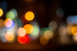 Unfocused, bokeh traffic and city lights at night