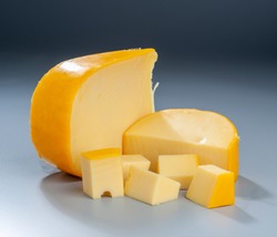 Gouda Cheese on dark background