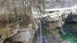 view of a waterfall on a river called traun in upper austria the picture was taken on a cold december day