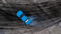 Drifting car, Aerial view professional driver drifting car on race track, Abstract texture and background black tire tracks skid on asphalt road, Wheel tire tracks background, Car tire track skid mark