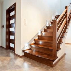 Luxury hallway with wooden stairs to bedroom on teh floor