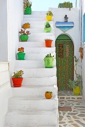 traditional stairs with flower pots at Ano Koufonisi island Cyclades Greece 