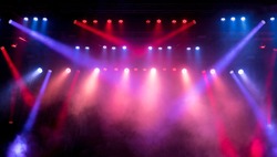 Lighting equipment on an empty stage. Red and blue.