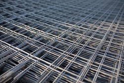 The rebar is bonded with steel wire for use as a construction infrastructure. Which part of the rebar has rusted due to chemical reactions