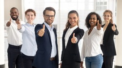 Business leaders with employees group showing thumbs up looking at camera, happy professional multicultural office team people recommend best corporate service, proud or good career, human resource