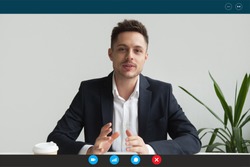 Headshot portrait screen application view of male employee have online interview using Web conference on computer, young businessman speak talk on video call on laptop with partner from home