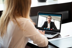 Businesswoman making video call to business partner using laptop, looking at screen with virtual web chat, contacting client by conference, talking on webcam, online consultation, hr concept, close up