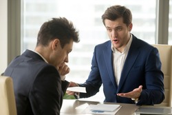 Angry mean boss yelling at employee for missing deadline, executive manager scolding ineffective salesman showing bad work results, firing worker for failure, team leader dissatisfied with report