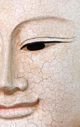 close-up face of white buddha