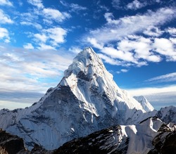 Mount Ama Dablam with beautiful clouds in the sky, way to Mt Everest base camp, Khumbu valley, Sagarmatha national park, Everest area, Nepal Himalaya mountain