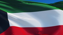 Kuwait flag waving against clean blue sky, close up, isolated with clipping path mask alpha channel transparency