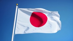 Japan flag waving against clean blue sky, close up, isolated with clipping path mask alpha channel transparency