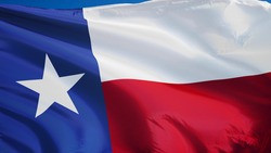 Texas flag waving against clean blue sky, close up, isolated with clipping path mask alpha channel transparency