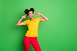 Photo of pretty dark skin lady assuring employers she is best choice for this job directing fingers on herself wear casual yellow t-shirt red pants isolated green background