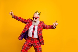 Photo of cool look grandpa white beard vip guy dancing strange youth moves little drunk wear crown sun specs plaid red blazer tie pants outfit isolated yellow color background
